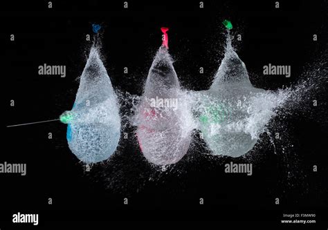 High Speed Photo Of Bursting Water Filled Balloon Stock Photo Alamy