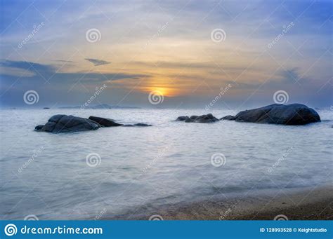Relaxing Seascape With Wide Horizon Of The Colorful Sky And Stones