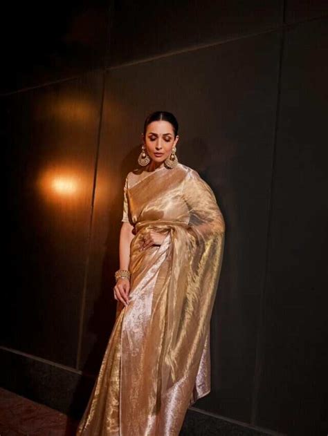 Malaika Arora Exudes Regal Elegance In A Dazzling Gold Saree Ottplay
