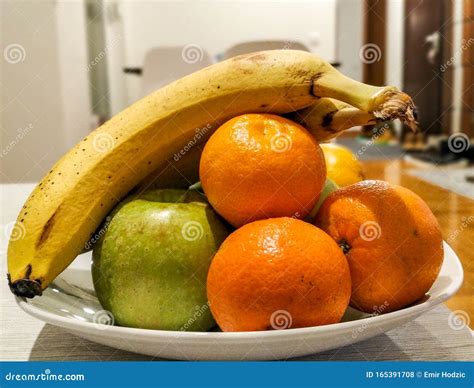 Bowl Of Fruit Apple Oranges And Banana On The Table Stock Photo Image