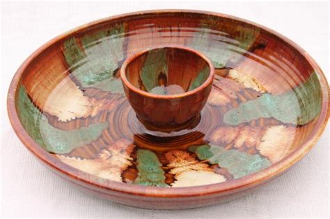 Keep your cheese dip hot and fresh all day long by serving it in this heated chip and dip tray. huge spatter drip glaze snack serving chip & dip bowl in ...