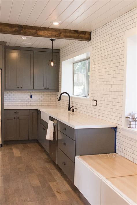 Wooden beam work not only covers up evidence of cracked drywall and plaster, but enhances the space with. Jenna Sue: Kitchen Chronicles: A DIY Subway Tile ...