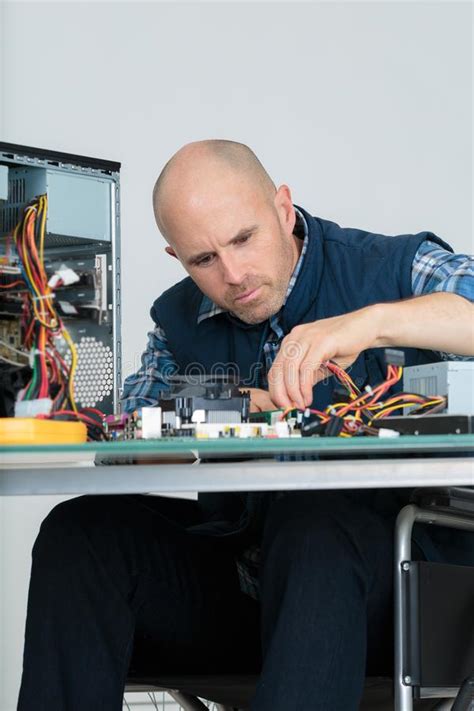 Computer Engineer Repairing Computer In Workshop Stock Image Image Of