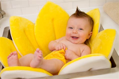 Keep your baby's face away from the pouring water and make sure to use warm, not hot, water. Blooming Bath Baby Bath - CoolHousewarmingGifts.com