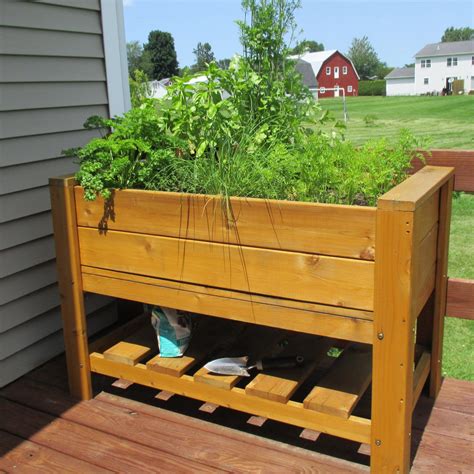 Whatever it is, we've brought you the perfect solution: Infinite Cedar Elevated Planter Box with Shelf | Hayneedle ...
