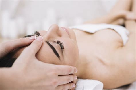 Woman Receiving A Relaxing Facial Massage Facial Massage Spa Images