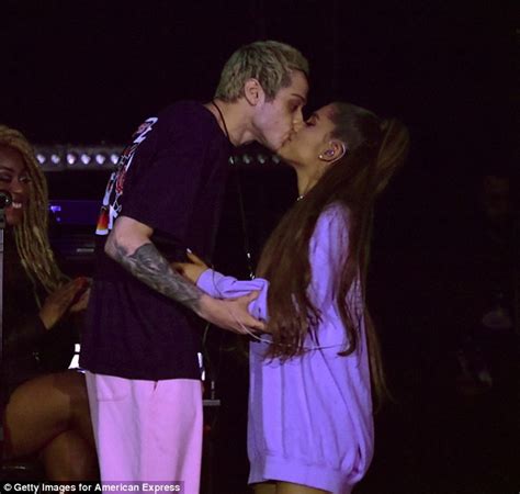 Ariana Grande Shares A Passionate Kiss On Stage With Fiancé Pete