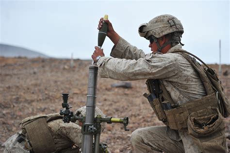 Marines Fire Their 60mm Mortar While Participating In A Company Attack