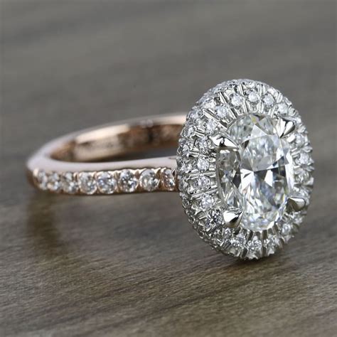 The engagement ring symbolises the promise of marriage. Custom Two-Tone Rose Gold Oval Diamond Engagement Ring