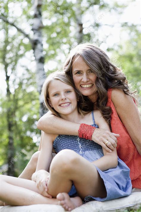 Mother And Daughter Cuddling Stock Image F0039488 Science Photo Library