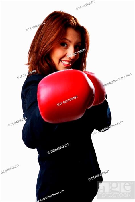 Smiling Businesswoman Wearing Boxing Gloves Punching Isolated On White