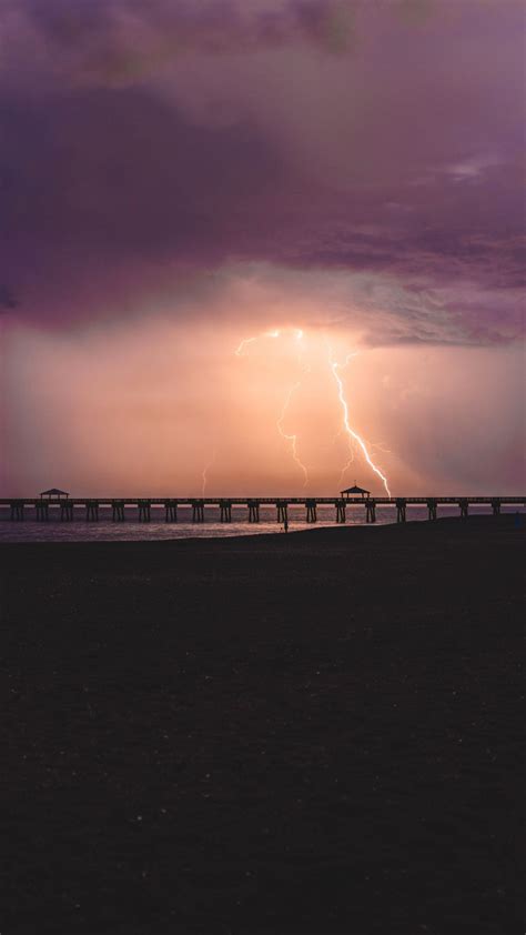 Sea Lightning Clouds Sky Night Ocean Storm Pier Download