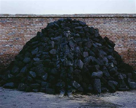 Liu Bolin Hiding In The City95 Coal Pile 2010 Liu Bolin Lhomme