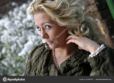 Attractive Blond Woman Her Forties Stock Photo Panthermediaseller