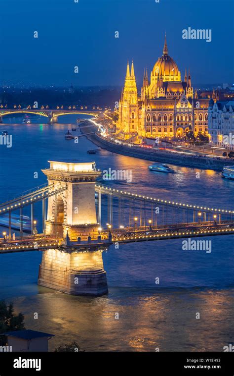 Aerial View Of Budapest Parliament And Chain Bridge Over Danube River