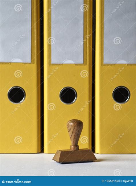 Ink Stamp And Yellow Document Folders Stock Image Image Of Stamps