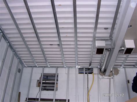 I am trying to install drywall in a room with sloped ceiling joists. Interior Construction -- Schoolhouse Energy Retrofit