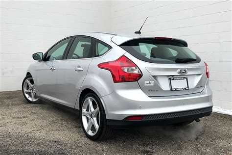 Priced below kbb fair purchase price! Pre-Owned 2014 Ford Focus Titanium 4D Hatchback in Morton ...