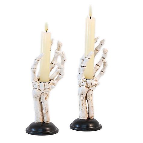 skeleton hands halloween taper candle holders best halloween candle holders 2020 popsugar