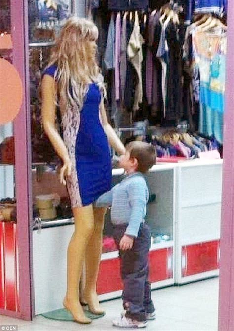 Curious Boy In Russia Puts Hand Up Mannequins Dress And Peeks Up It