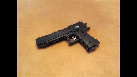 Here is the real tutorial: Lego: Desert Eagle (Blowback) + Instructions - YouTube