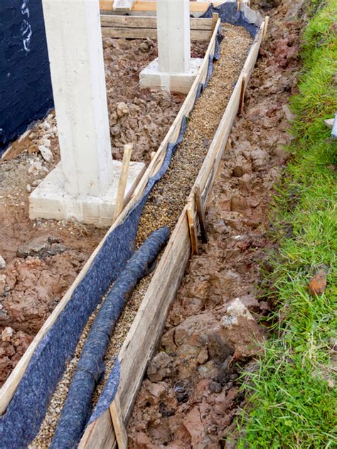 You just need to find out where the high spots and low spots are and build the drain between these points. Yard Drainage System Enhancement | Water Drainage Solutions