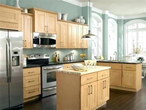 Grays and blacks can offset creamier versions of the honey oak kitchen cabinets. natural oak cabinets oak cabinet kitchens captivating ...