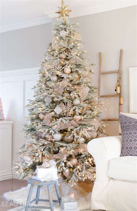 Christmas time luxury golden purple blue christmas ball and. A snowy flocked Christmas tree decorated in silver and rose gold adds a big dos… | Snowy ...