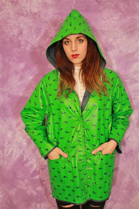 Green PVC Hooded Raincoat | Hooded raincoat, 80s fashion, Raincoat