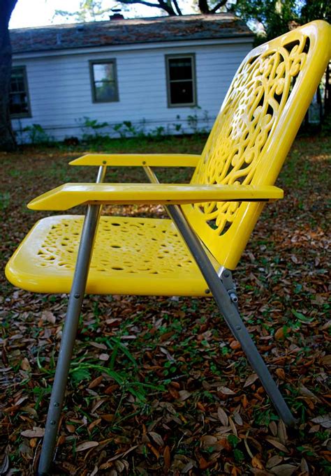 Use as a garden bench when relaxing and as a stand when doing garden work. junk2funk: Retro Yellow Folding Chairs