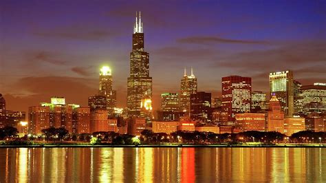 Want to hear more about chicago? Chicago Skyline At Night Photograph by Thomas Kurmeier
