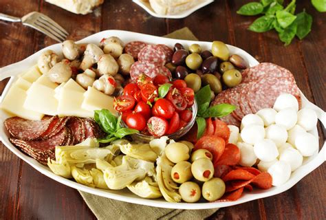 This antipasto platter is a combination of italian meats, cheeses, vegetables and breads, all arranged to create a fabulous appetizer display. How To Assemble An Antipasto Platter | Antipasto ...