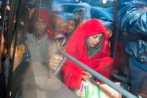 Refugees Arrive In Austria From Hungary As Desperate Migrant Families Board Buses To Border