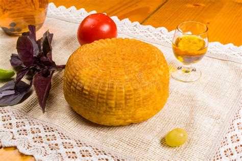 National Adyghe Cheese Homemade On A Woven Cloth With Basil Tomato