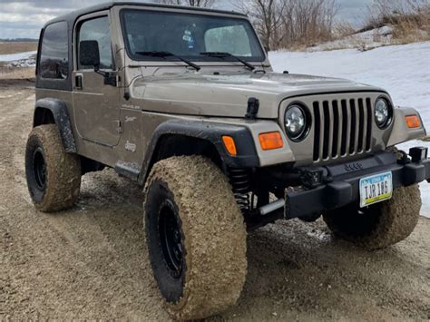 2002 Jeep Tj With 15x8 19 Vision Manx And 33125r15 Falken Wildpeak