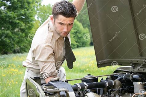 Handsome American Wwii Gi Army Officer In Uniform And Rolled Up Sleeves