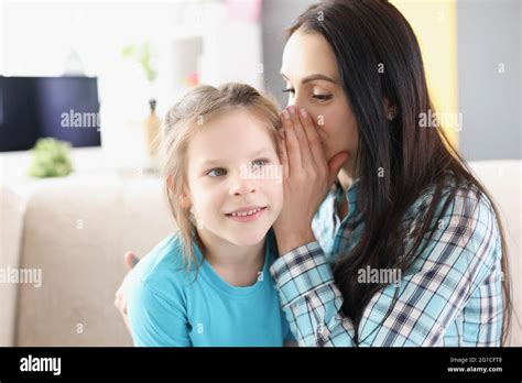 Little Girl Whispering Adult Ear Hi Res Stock Photography And Images