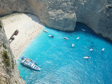 The Zakynthos Shipwreck Beach The Sun Reflects From The Surrounding
