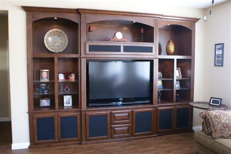 They're usually designed around supporting a tv with cabinets and shelves for media players. 10 Best Designs of In Wall Entertainment Center You May be ...