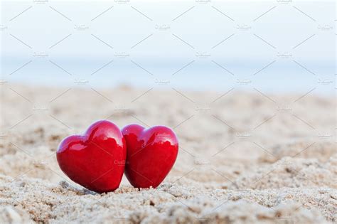 Two Red Hearts On The Beach High Quality Holiday Stock Photos