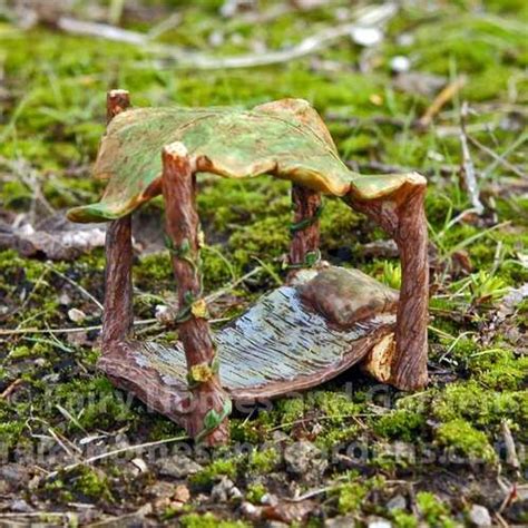 Detailed etched brass posts, displaying ornate brass. The woodland knoll fairy bed has a leaf for a canopy ...