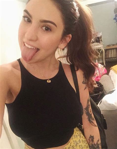 Girls Sticking Out Their Tongue