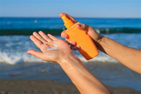Close Up Of Woman Applying Suntan Lotion Sand Beach Blue Sea Background Stock Image Image Of