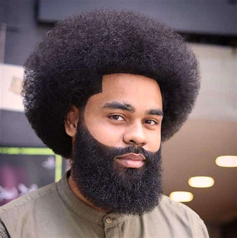 When looking for a trendy new men's hairstyle for 2021, the skin fade haircut is your new best friend. Afro + Taper Fade Haircut: 15 Dope Styles For 2021