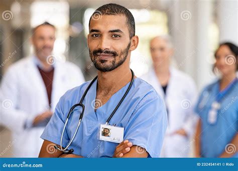 Young Confident Male Nurse Looking At Camera Stock Image Image Of