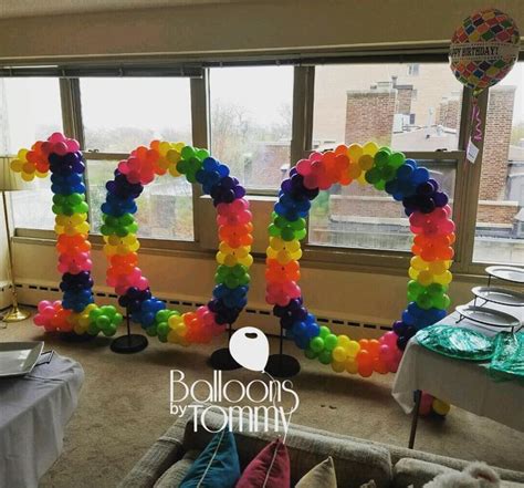 A 100th Birthday Celebration Calls For A Large 100 Balloon Sculpture