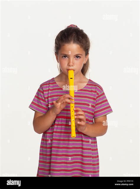 Girl Playing A Recorder Front View Stock Photo Alamy