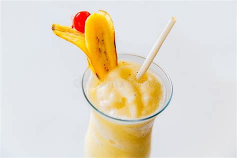 A Glass Of Healthy Banana Juice Drink With Pulp Decorated With A Slice
