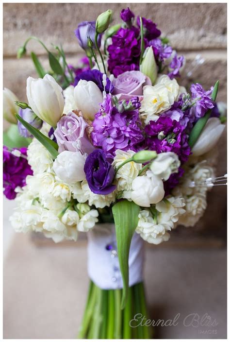 Florists love to add it to bouquets and various floral arrangements. Stunning bouquet with purple and white flowers, including ...