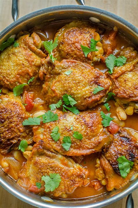 Chicken thigh recipes include quick pesto baked chicken thighs and braised chicken thighs with basil. Braised Chicken Thighs with Tomato and Garlic - Kitchen ...